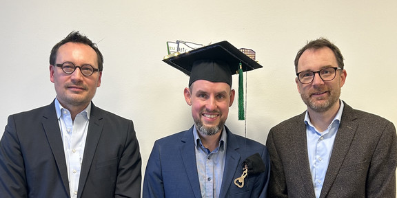 Marcel Altendeitering with Christian Janiesch and Falk Howar after defending his doctoral dissertation